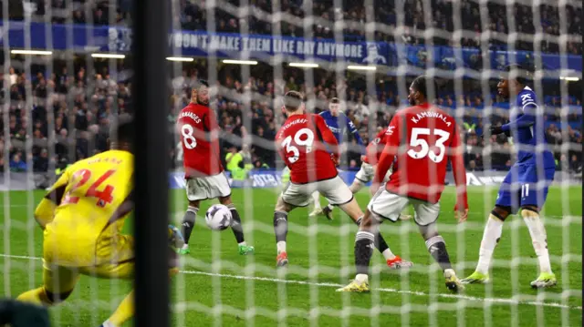 Cole Palmer scores his third goal against Manchester United