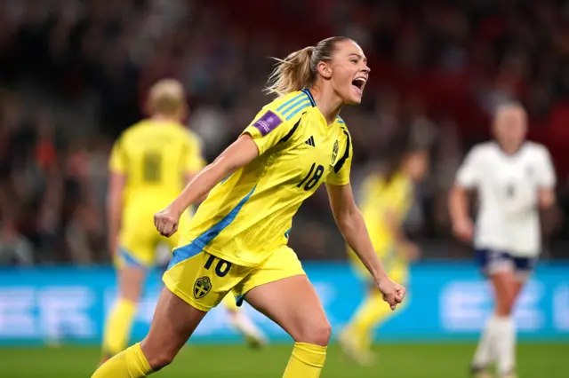 Sweden's Fridolina Rolfo celebrates equalising against England