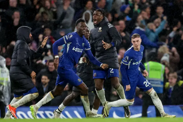 Chelsea players celebrate Cole Palmer’s winning goal against Manchester United