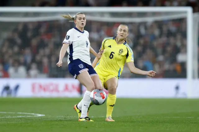 England’s Alessia Russo (left) and Sweden’s Magdalena Eriksson battle for the ball during the UEFA Women's Euro 2025 qualifying round League A, Group A3 match at Wembley Stadium, London