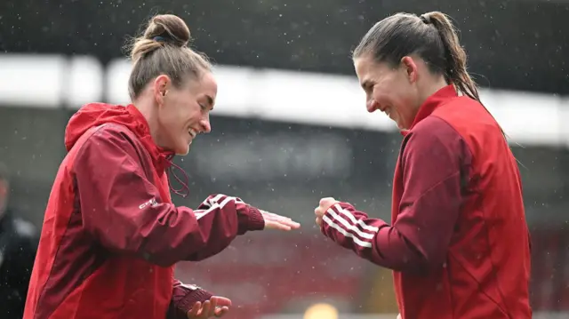 Rachel Rowe and Wales' Alice Griffiths during a training session