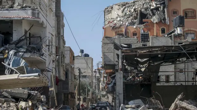 Destroyed houses in Al Nuseirat refugee camp, central Gaza Strip, 28 February 2024