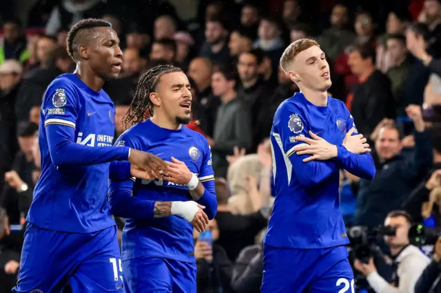 Cole Palmer celebrates his first goal against Manchester United