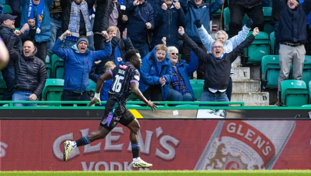 Adama Sidibeh celebrates scoring against Hibs