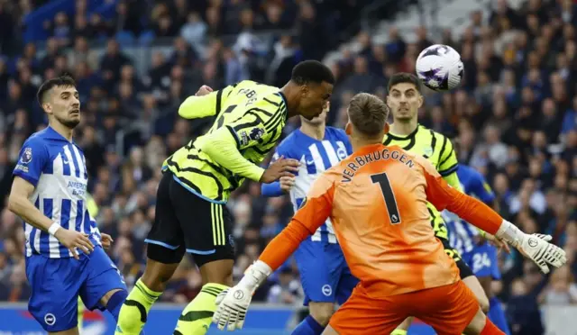 Arsenal's Gabriel heads at goal