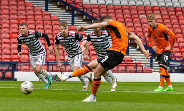 Dundee United's Louis Moult has a penalty saved