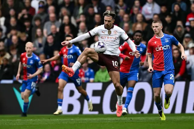 Grealish takes the ball down in midfield