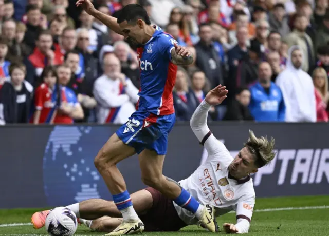 Jack Grealish slide tackles Daniel Munoz