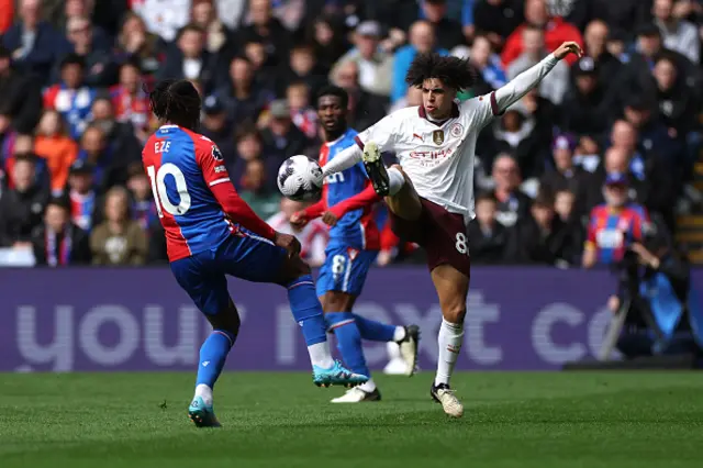 Manchester City's Julian Alvarez (right) shoots wide