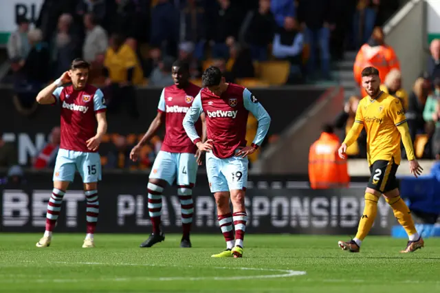 Edson Alvarez of West Ham United looks dejected