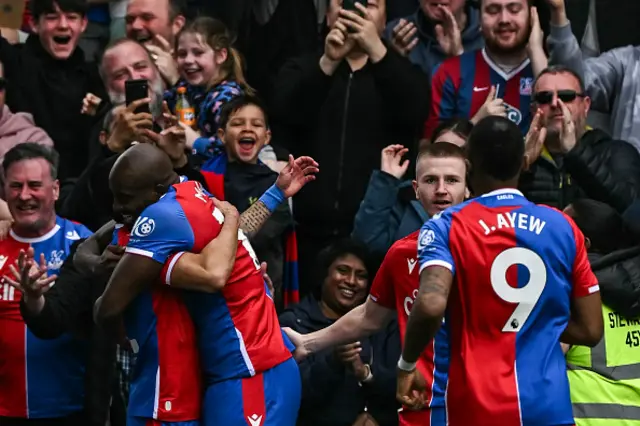 Jean-Philippe Mateta (C) celebrates after scoring with teammates