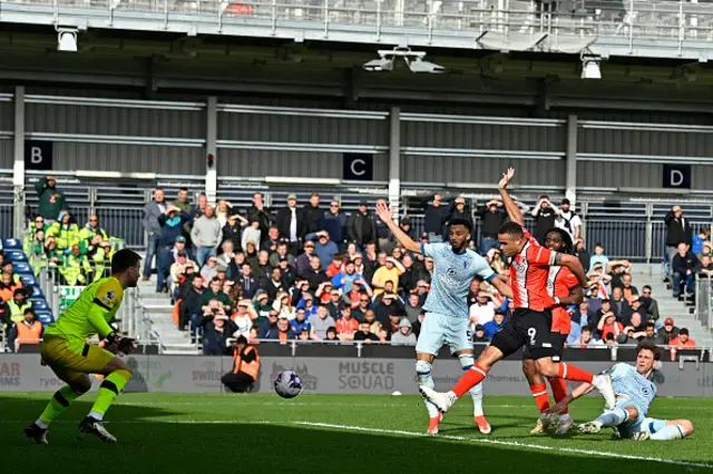 Carlton Morris scores from close range