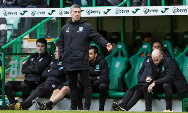 Hibs boss Nick Montgomery in the dugout at Easter Road