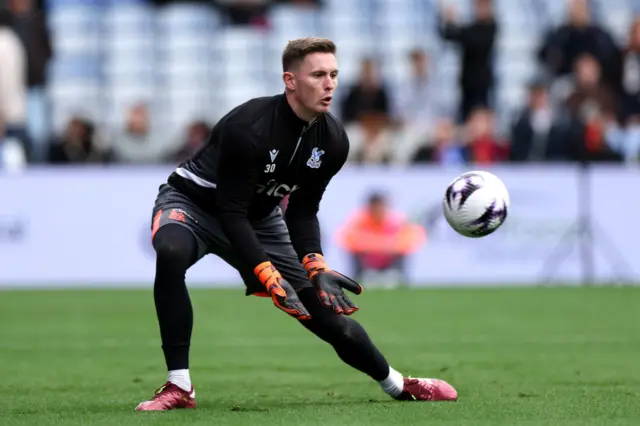 Henderson catches a ball in the warm up