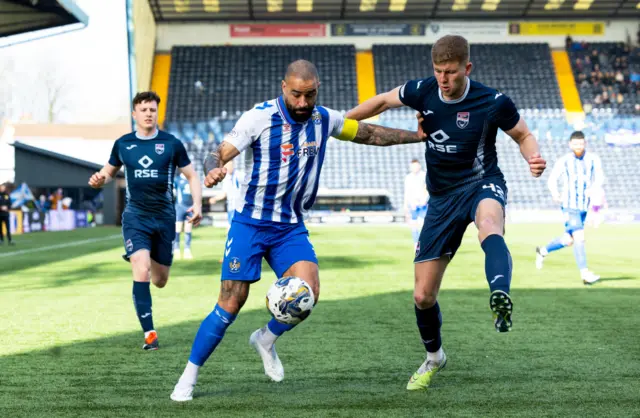 Kilmarnock forward Kyle Vassell with Ross County defender Ryan Leak