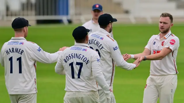 Sam Cook celebrates a wicket