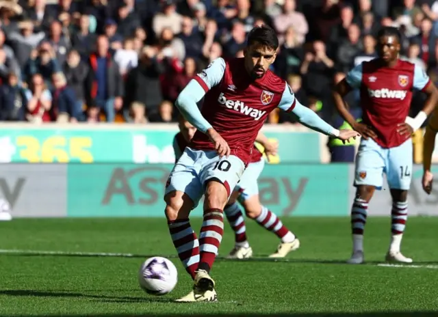 Lucas Paqueta shoots form the penalty spot