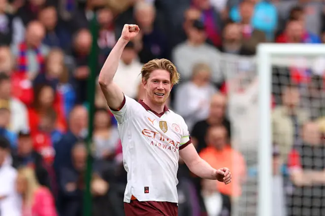 Kevin de Bruyne smiles after scoring