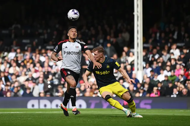 Rodrigo Muniz of Fulham is challenged by Emil Krafth