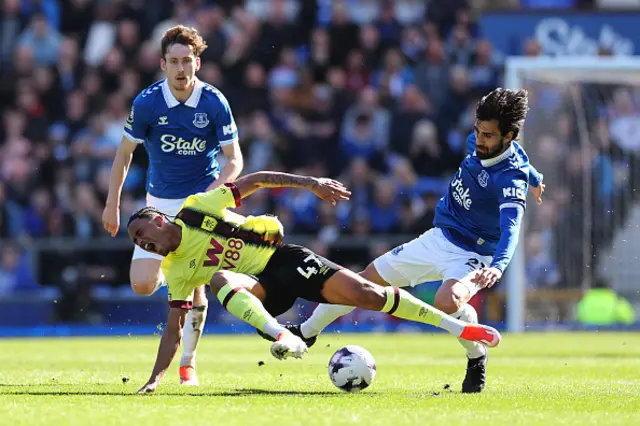 Wilson Odobert of Burnley is challenged by Andre Gomes