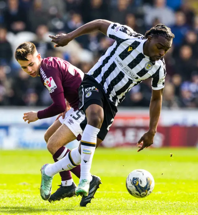 St Mirren's Toyosi Olusanya and Hearts' Macauley Tait