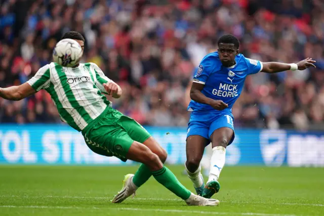 Peterborough's Kwame Poku shoots at goal