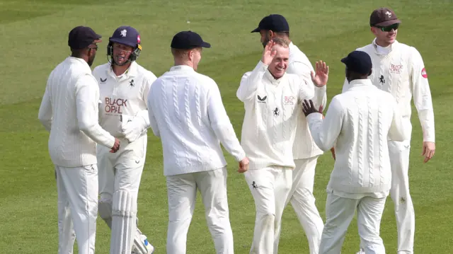 Matt Parkinson celebrates a wicket for Kent