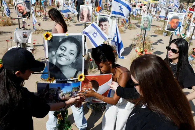 People visit the site of the Nova festival, six months after the deadly October 7 attack on Israel by Palestinian Islamist group Hamas, in Reim, southern Israel, April 7, 2024.