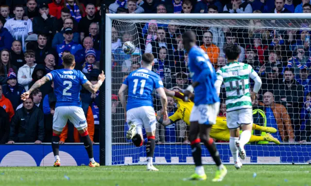 Rangers' James Tavernier scores from the penalty spot to make it 2-1 during a cinch Premiership match between Rangers and Celtic at Ibrox Stadium, on April 07, 2024, in Glasgow, Scotland.