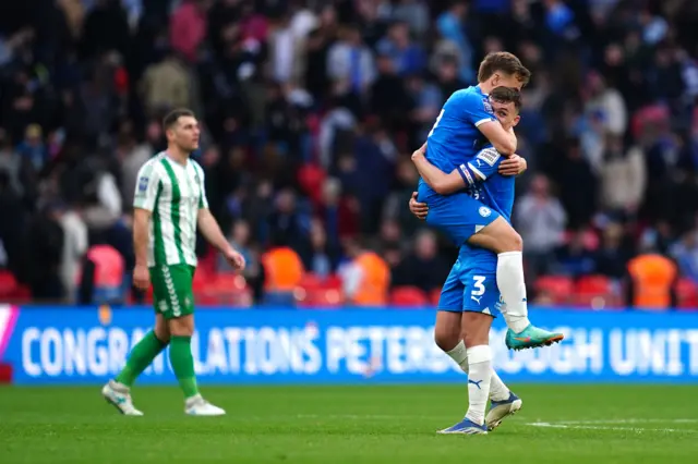 Peterborough players celebrate their EFL Trophy win