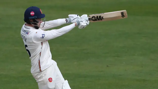 Sam Cook hits a six for Essex