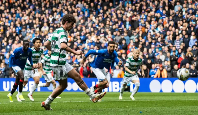 Celtic's Matt O'Riley scores to make it 2-0 during a cinch Premiership match between Rangers and Celtic at Ibrox Stadium, on April 07, 2024, in Glasgow, Scotland.