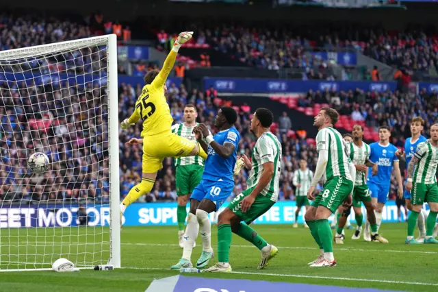 Harrison Burrows scores Peterborough's winner in the EFL Trophy