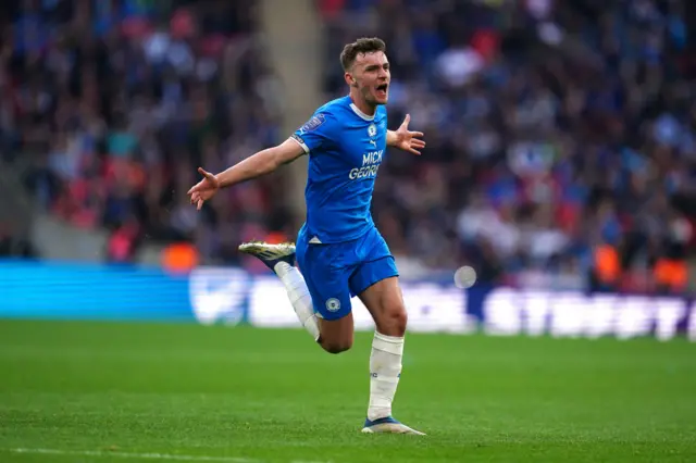 Harrison Burrows celebrates scoring Peterborough's winner