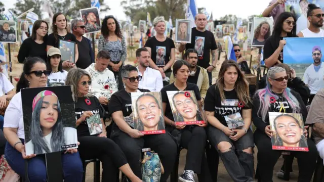 Family members visit the memorial site for victims killed during the Nova music festival in the October 07 Hamas attacks, near the border with Gaza Strip, southern Israel , 07 April 2024.