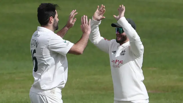 Brett Hutton celebrates a wicket for Nottinghamshire