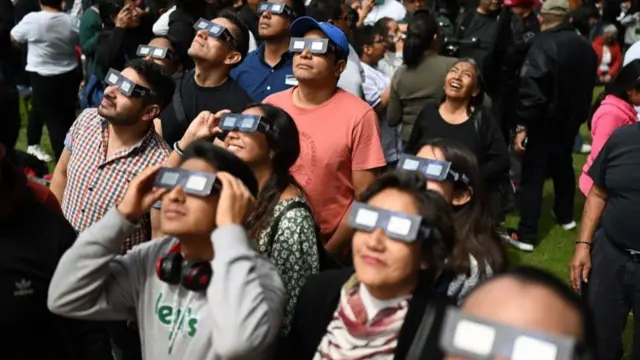 Skygazers across the Americas turned their faces upwards Saturday for a rare celestial event: an annular solar eclipse.