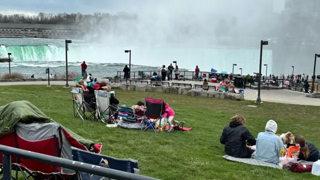 People awaiting the total solar eclipse on the US side of Niagara Falls