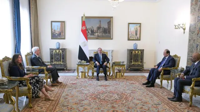 Egyptian President Abdel Fattah El-Sisi (C) is seen sitting at a meeting with CIA Director William J. Burns (2-L) at the Al-Ittihadiya Palace in Cairo. They are joined by three others who are seated in gold chairs