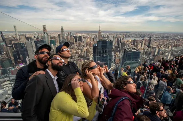 People in New York viewing the solar eclipse