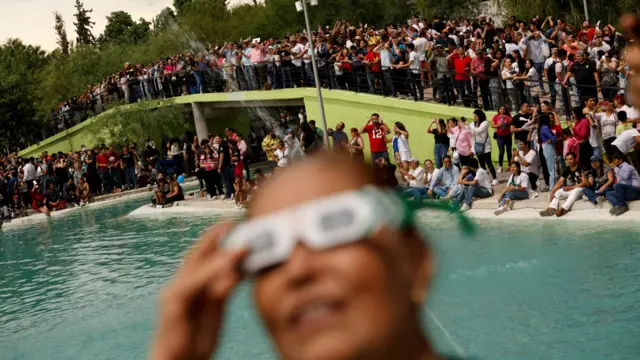 People observe the solar eclipse, in Torreon, state of Coahuila, Mexico