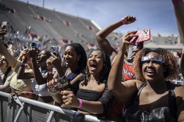 People gather to see the solar eclipse