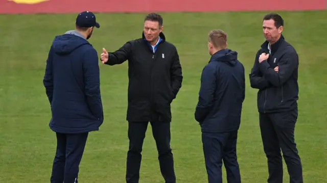 Discussions between captains and umpires at Durham