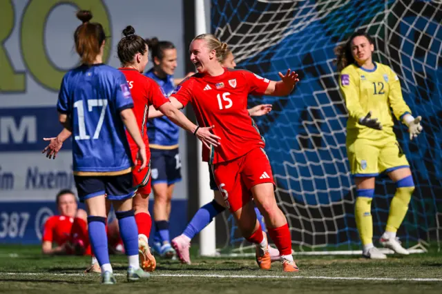 Elise Hughes celebrates