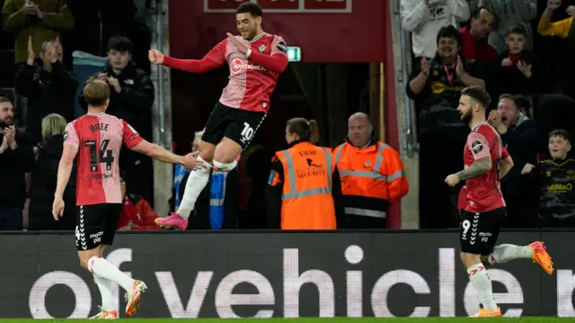 Che Adams celebrates scoring