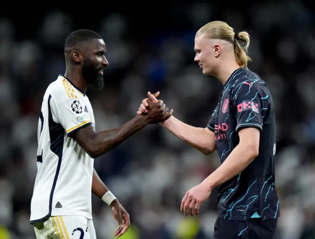 Rudiger and Haaland shake hands at FT