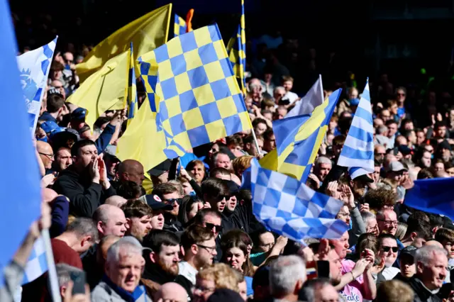 Everton fans waving flags