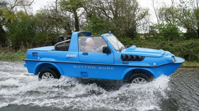 Dutton Surf kit car being driven through flood water in Littlehampton