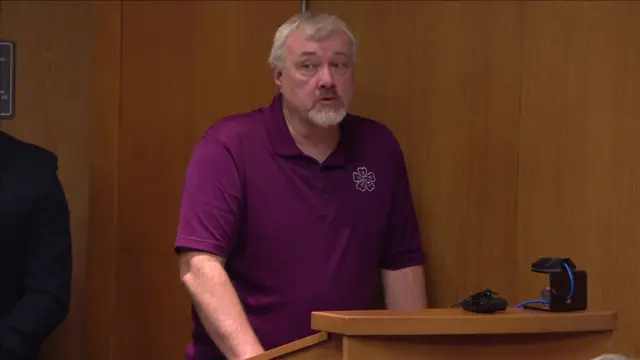 Man standing in court