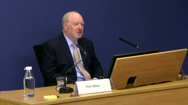 Former sub-postmaster Alan Bates gives evidence to the post office inquiry in the witness box.